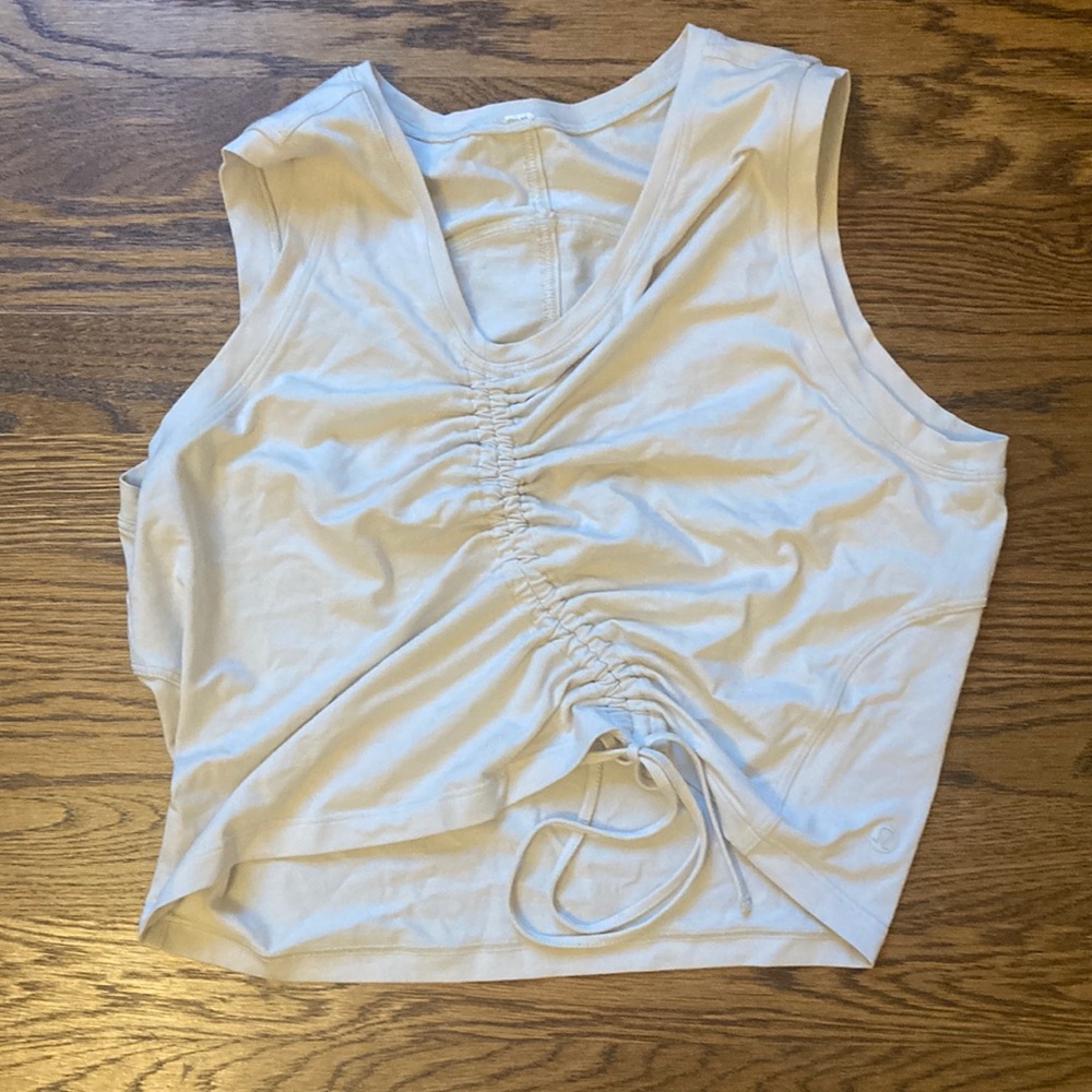 Off white lululemon slightly cropped tank top with string to tie